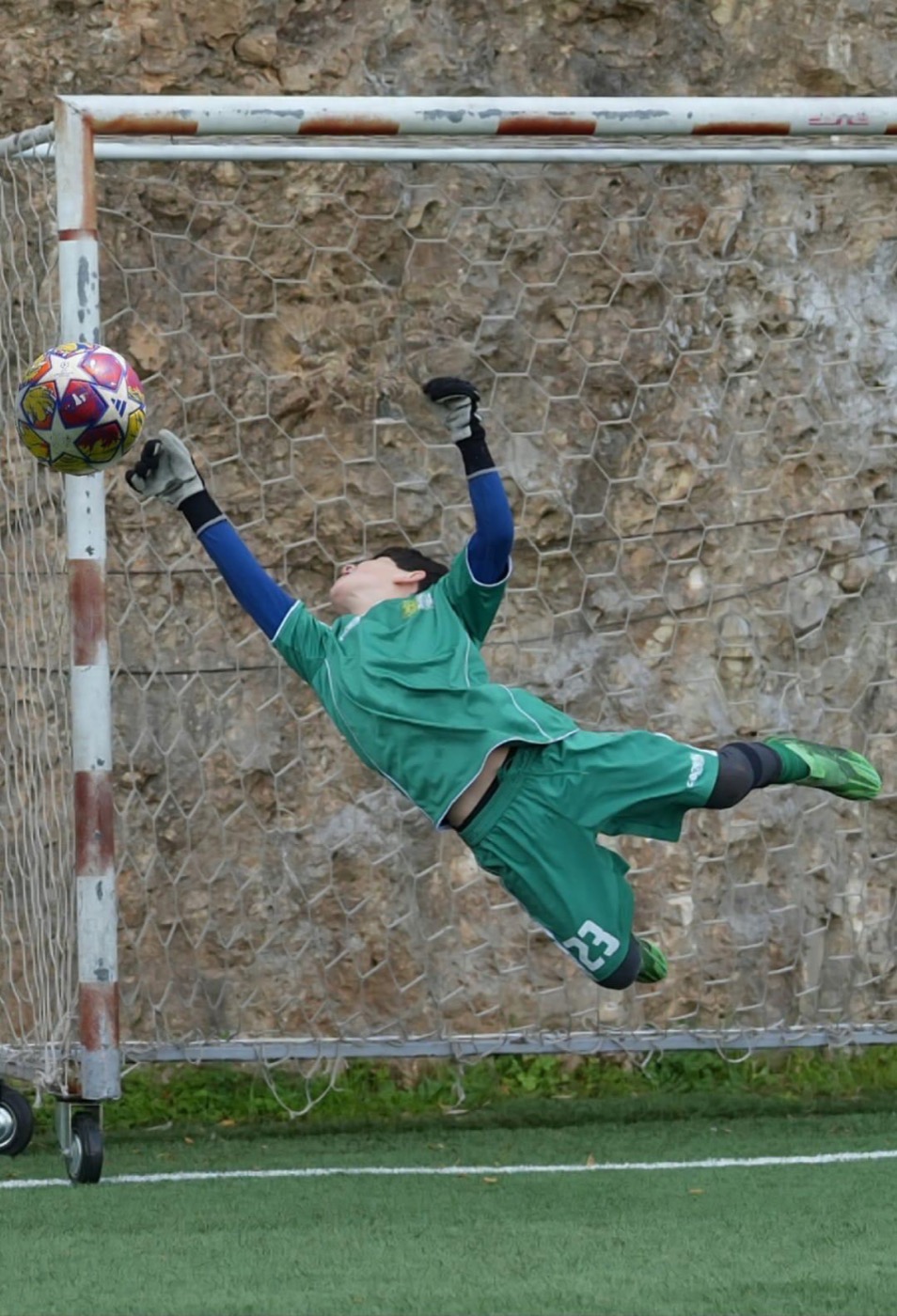Lucas diving to make a match-winning save